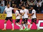 Bolton Wanderers' Dion Charles celebrates scoring their first goal with teammates on August 23, 2022