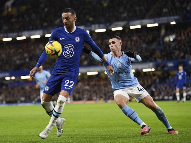 Chelsea's Hakim Ziyech in action with Manchester City's Phil Foden on January 5, 2023