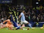 Manchester City attacker Riyad Mahrez scores against Chelsea on January 5, 2023