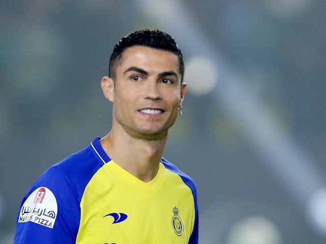 The new Al Nassr signs Cristiano Ronaldo during his presentation on January 3, 2023