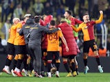 Galatasaray players and coaches celebrate after the match on January 8, 2023