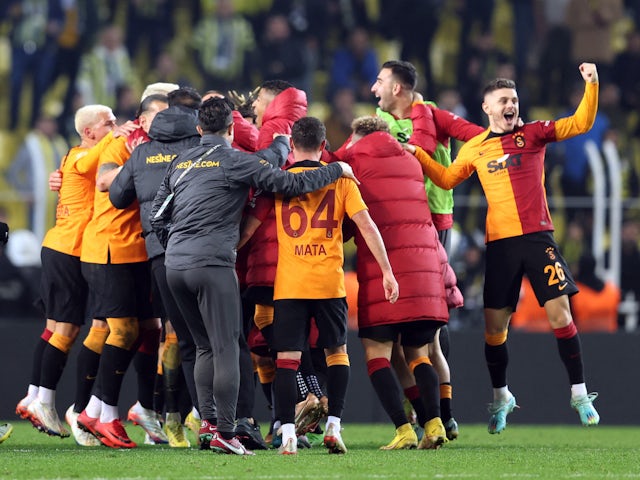 Galatasaray players and coaches celebrate after the match on January 8, 2023