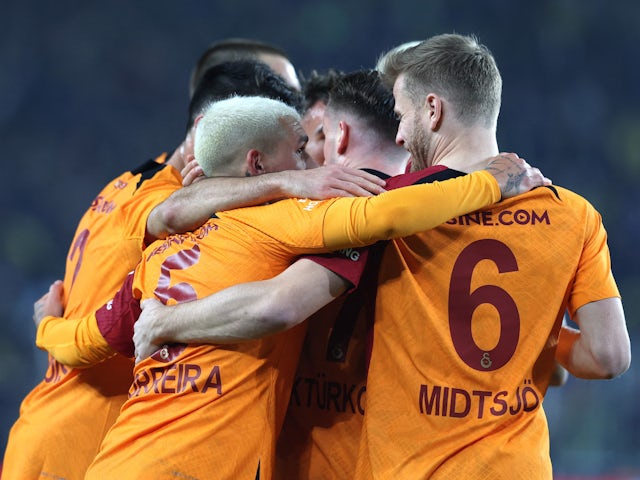 Galatasaray's Kerem Akturkoglu celebrates scoring their second goal with teammates on January 8, 2023
