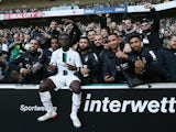 Borussia Monchengladbach's Kouadio Kone celebrates with fans after the match in October 2022