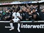 Borussia Monchengladbach's Kouadio Kone celebrates with fans after the match in October 2022