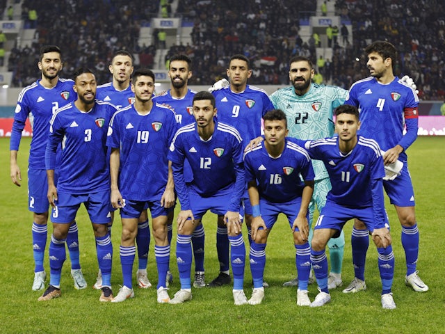 Kuwait players pose for a team group photo before the match on January 7, 2023