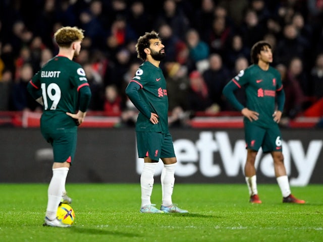 Liverpool players look dejected after Yoane Wissa scores for Brentford on January 2, 2022