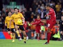 Liverpool's Joel Matip in action with Wolverhampton Wanderers' Raul Jimenez on January 7, 2023