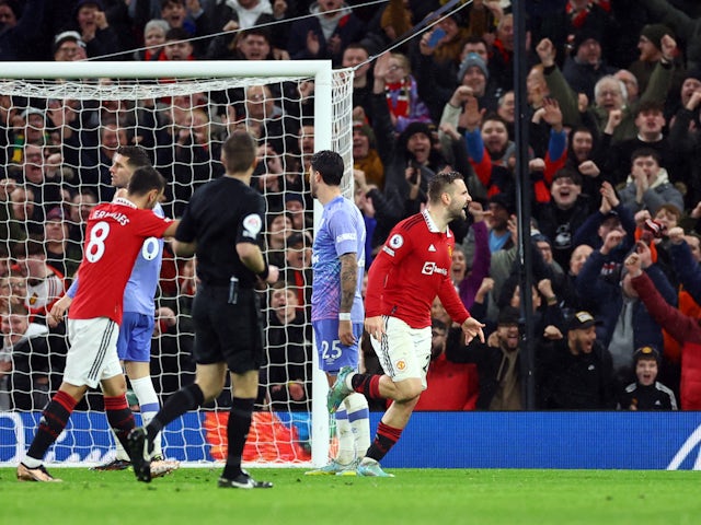 Luke Shaw celebrates scoring for Manchester United on January 3, 2022
