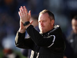 Walsall's manager Michael Flynn applauds fans before the match on January 8, 2023