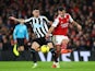 Newcastle United's Miguel Almiron in action with Arsenal's Granit Xhaka on January 3, 2023