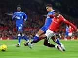 Manchester United's Marcus Rashford in action with Everton's Ben Godfrey on January 6, 2023
