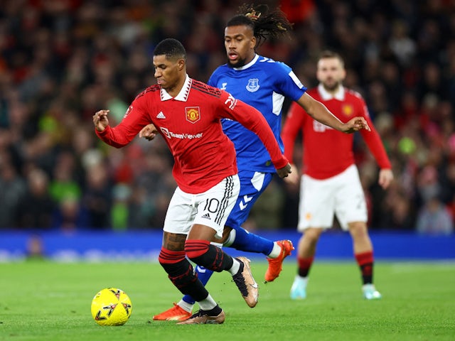 Manchester United's Marcus Rashford in action with Everton's Alex Iwobi on January 6, 2023