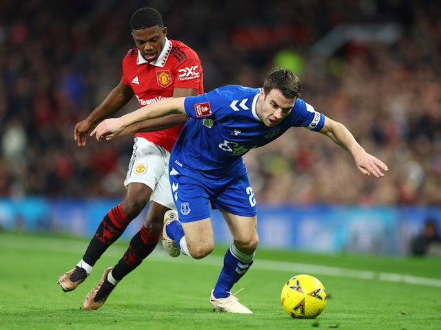 Everton's Seamus Coleman in action with Manchester United's Tyrell Malacia on January 6, 2023