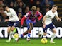 Crystal Palace's Wilfried Zaha in action with Tottenham Hotspur's Bryan Gil and Oliver Skipp on January 4, 2023