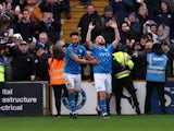 Stockport County's Paddy Madden celebrates scoring their first goal on January 8, 2023
