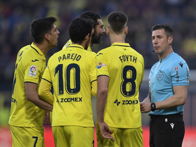 Villarreal players remonstrate with referee Cesar Soto Grado before a penalty is awarded to Real Madrid on January 7, 2023