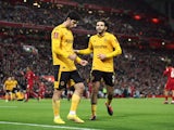 Wolverhampton Wanderers' Goncalo Guedes celebrates scoring their first goal with Rayan Ait-Nouri on January 7, 2023