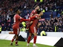 Aberdeen's Bojan Miovski celebrates scoring their first goal with Hayden Coulson and Duk on January 15, 2023