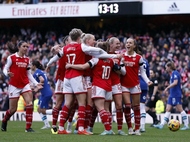 Arsenal Women's Kim Little celebrates scoring their first goal with teammates on January 15, 2023