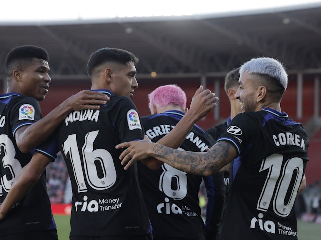Atletico Madrid's Angel Correa celebrates scoring their first goal with Antoine Griezmann, Nahuel Molina and teammates on January 15, 2023