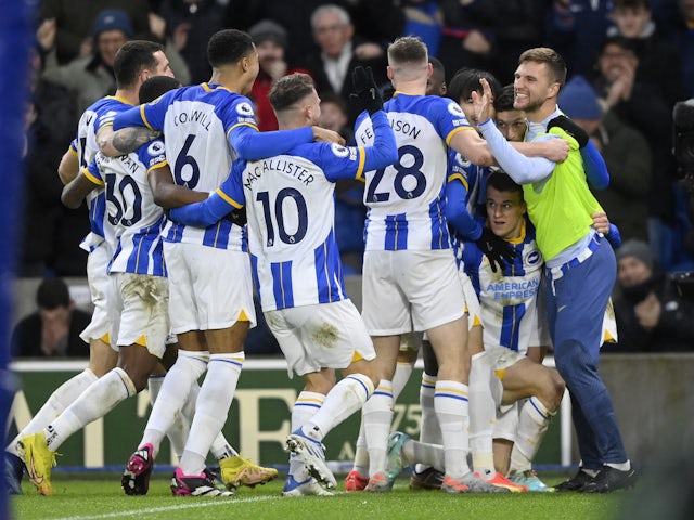 Brighton & Hove Albion's Solly March celebrates scoring their first goal with teammates on January 14, 2023