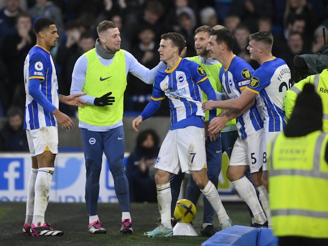 Brighton & Hove Albion's Solly March celebrates scoring their second goal with teammates on January 14, 2023