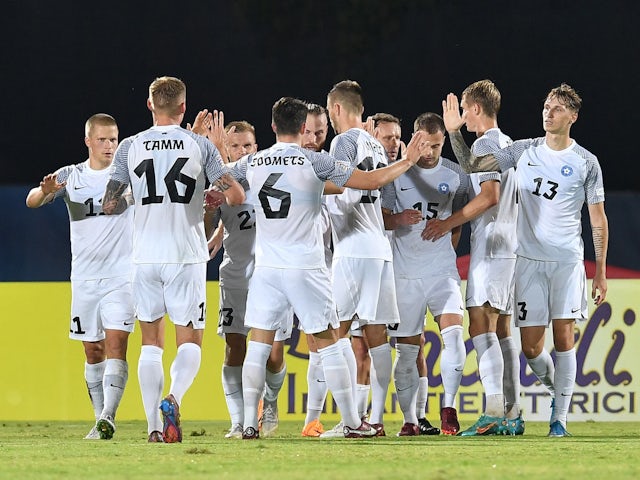 Estonia's Henri Anier celebrates scoring their first goal with teammates on September 26, 2022