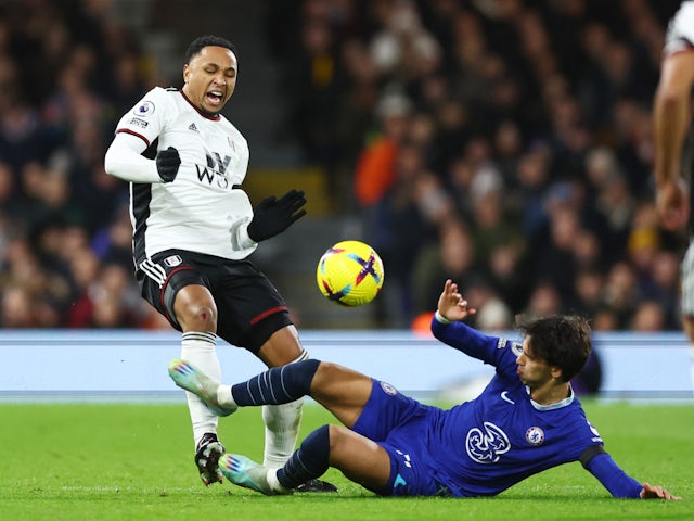 Chelsea's Joao Felix tackles Fulham's Kenny Tete on January 12, 2023