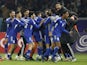 Kuwait's Ahmed Al Dhefiri celebrates scoring their first goal with teammates and coaching staff on January 10, 2023