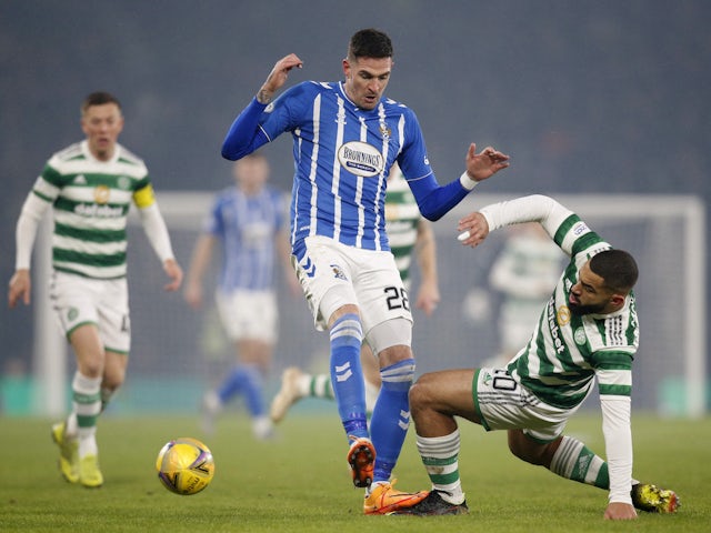 Kilmarnock's Kyle Lafferty in action with Celtic's Cameron Carter-Vickers on January 14, 2023