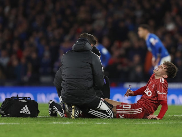 Aberdeen's Leighton Clarkson receives medical attention after sustaining an injury on January 15, 2023