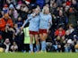 Manchester City Women's Laura Coombs celebrates scoring their first goal with Lauren Hemp on December 11, 2022