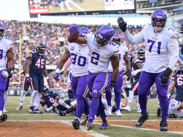 Minnesota Vikings running back Alexander Mattison (2) celebrates his rushing touchdown during the second quarter against the Chicago Bears at Soldier Field on January 8, 2023