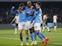 Napoli's Victor Osimhen celebrates scoring their first goal with Khvicha Kvaratskhelia and Giovanni Di Lorenzo on January 13, 2023