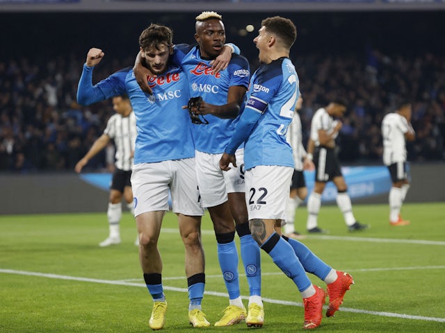 Napoli's Victor Osimhen celebrates scoring their first goal with Khvicha Kvaratskhelia and Giovanni Di Lorenzo on January 13, 2023