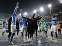 Napoli's Victor Osimhen with teammates celebrate after the match on January 13, 2023