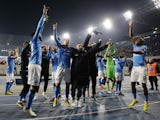 Napoli's Victor Osimhen with teammates celebrate after the match on January 13, 2023