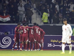 Qatar's Ahmed Alaaeldin celebrates scoring their first goal with teammates on January 10, 2023