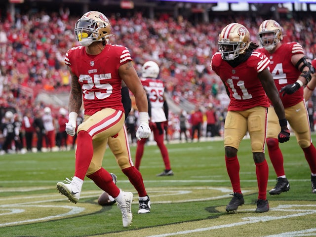 San Francisco 49ers running back Elijah Mitchell (25) reacts after scoring a touchdown against the Arizona Cardinals in the third quarter at Levi's Stadium on January 9, 2023