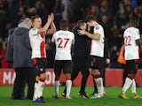 Southampton manager Nathan Jones and Duje Caleta-Car celebrate after the match on January 11, 2023