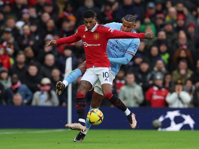 Manchester United's Marcus Rashford in action with Manchester City's Manuel Akanji on January 14, 2023