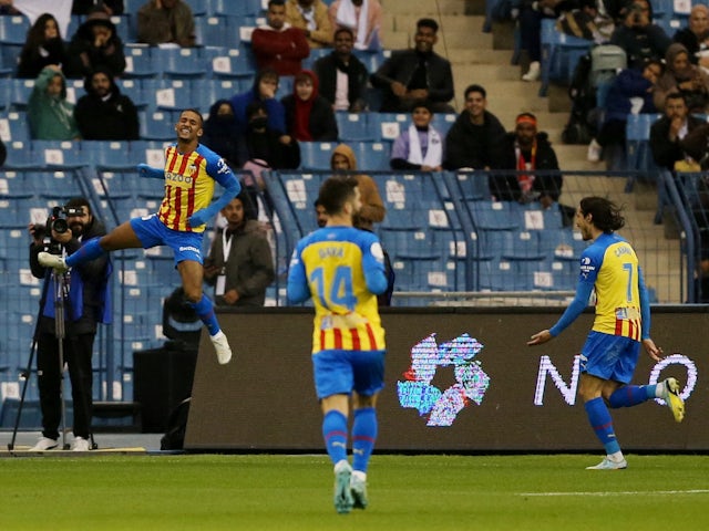 Valencia's Samuel Dias Lino celebrates scoring their first goal with Edinson Cavani on January 11, 2023