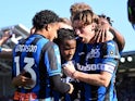 Atalanta's Ademola Lookman celebrates scoring their first goal with Hans Hateboer and Ederson on November 13, 2022