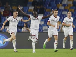 Bologna's Musa Barrow celebrates scoring their second goal with teammates on October 16, 2022