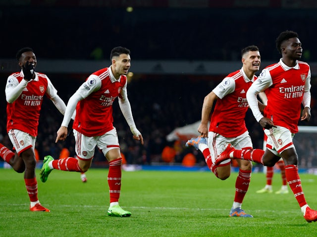 Arsenal's Bukayo Saka celebrates scoring against Manchester United on January 22, 2023
