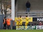 Burton Albion's Jonny Smith celebrates with teammates after scoring their first goal on November 27, 2022