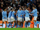 Manchester City players celebrate Riyad Mahrez's goal against Tottenham Hotspur on January 19, 2023