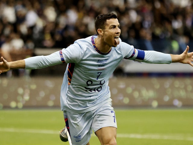 Saudi Pro League XI's Cristiano Ronaldo celebrates scoring their second goal on January 19, 2023