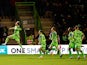 Forest Green Rovers' Ben Stevenson celebrates scoring their first goal with teammates on January 17, 2023